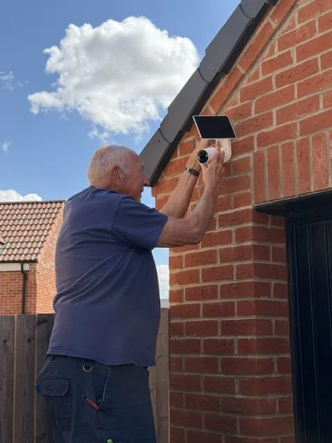 TR Electrical Services installing a CCTV camera